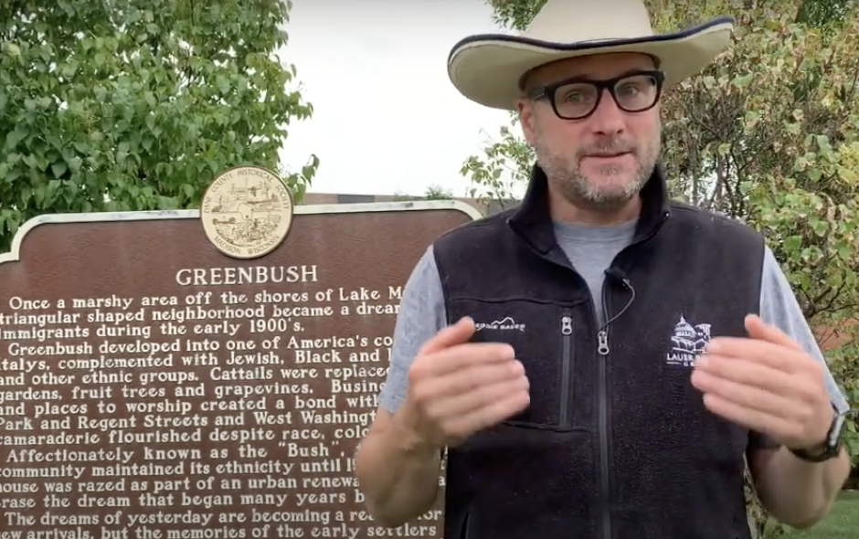 Ben Anton in front of the Greenbush sign.