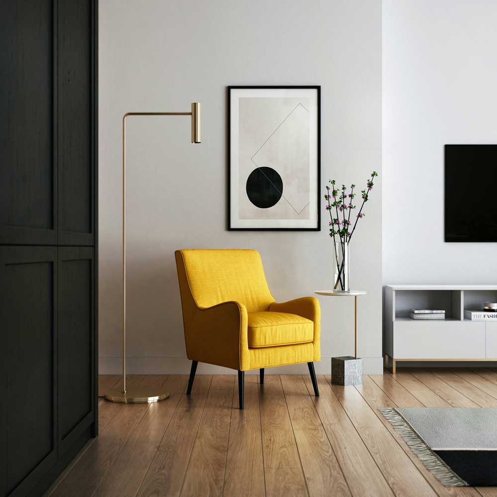 Modern living room with a yellow accent chair, minimalist decor, and natural lighting showcasing effective home staging tips for creating a welcoming and stylish space.